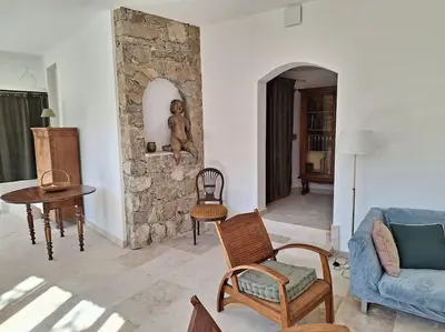 Coin salon dans l'établissement Casa di Pilou - Maison et jardin près de la mer - Corbara