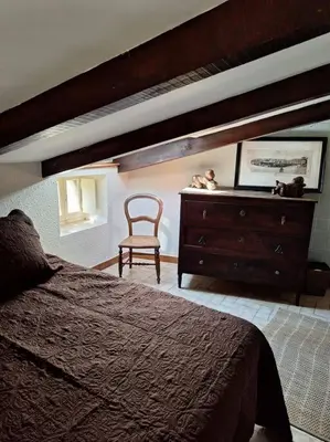 Un ou plusieurs lits dans un hébergement de l'établissement Casa di Pilou - Maison et jardin près de la mer - Corbara