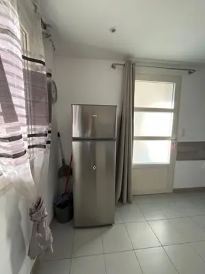 Cuisine ou kitchenette dans l'établissement F2 REZ DE VILLA ENTRE MER ET MONTAGNE