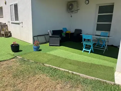 Jardin de l'établissement F2 REZ DE VILLA ENTRE MER ET MONTAGNE