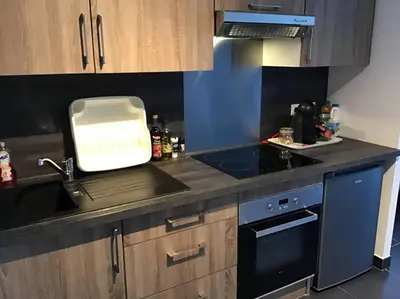 Cuisine ou kitchenette dans l'établissement Superbe T1 à bastia vue sur mer