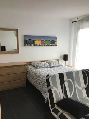 Un ou plusieurs lits dans un hébergement de l'établissement Superbe T1 à bastia vue sur mer