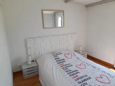 Un ou plusieurs lits dans un hébergement de l'établissement Villa, maison bord de mer climatisée