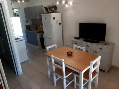 Cuisine ou kitchenette dans l'établissement Villa, maison bord de mer climatisée