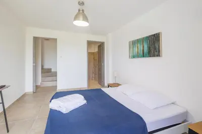 Un ou plusieurs lits dans un hébergement de l'établissement Casa Sulia