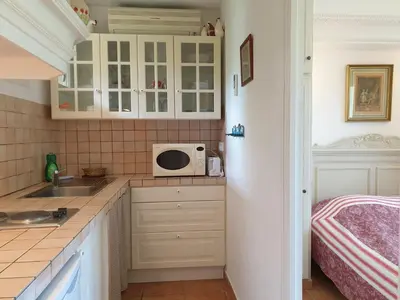 Cuisine ou kitchenette dans l'établissement Apartment studio 18-20m2 by Interhome