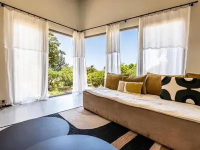 Coin salon dans l'établissement Villa Casa Suttana by Interhome