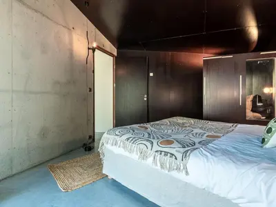 Un ou plusieurs lits dans un hébergement de l'établissement Villa Casa Suttana by Interhome