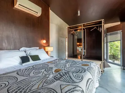 Un ou plusieurs lits dans un hébergement de l'établissement Villa Casa Suprana by Interhome