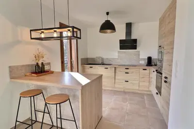 Cuisine ou kitchenette dans l'établissement Maison U CASTAGNU