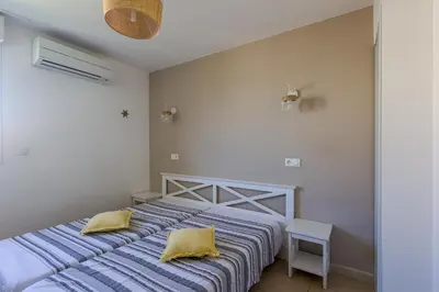 Un ou plusieurs lits dans un hébergement de l'établissement Maison Fab & Jo - Proche de lîle rousse
