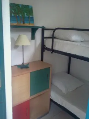 Un ou plusieurs lits dans un hébergement de l'établissement Appartement F1 Calvi à 150 mètres de la plage