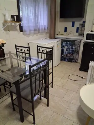Cuisine ou kitchenette dans l'établissement Studio plage