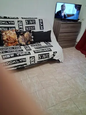 Télévision ou salle de divertissement dans l'établissement Studio plage