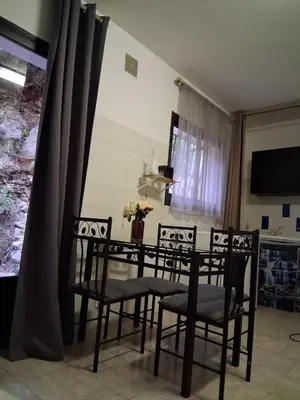 Télévision ou salle de divertissement dans l'établissement Studio plage