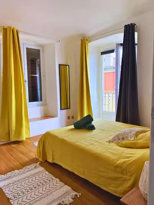 Un ou plusieurs lits dans un hébergement de l'établissement Appartement vue sur mer