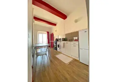 Cuisine ou kitchenette dans l'établissement Appartement vue sur mer