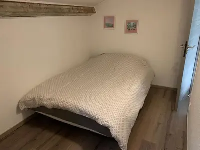 Un ou plusieurs lits dans un hébergement de l'établissement Prunete - Appartement - 2 personnes - Piscine