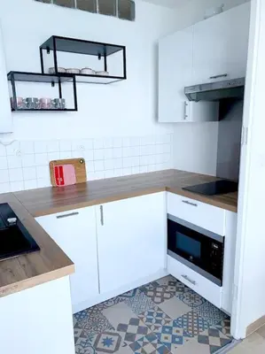 Cuisine ou kitchenette dans l'établissement Appartement en bord de mer