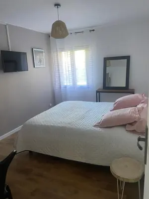 Un ou plusieurs lits dans un hébergement de l'établissement Appartement proche du départ du GR20