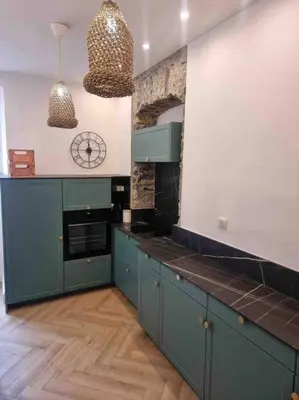 Cuisine ou kitchenette dans l'établissement Appartement au cœur de la ville