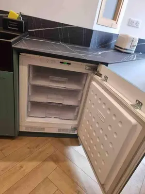 Cuisine ou kitchenette dans l'établissement Appartement au cœur de la ville