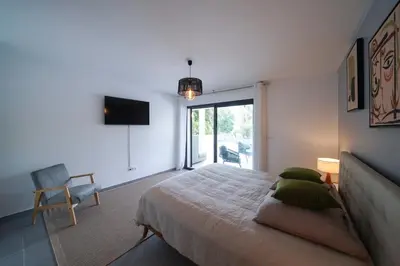Un ou plusieurs lits dans un hébergement de l'établissement Très belle villa à Ghisonaccia avec piscine chauffée