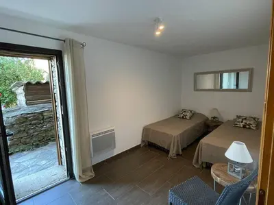 Un ou plusieurs lits dans un hébergement de l'établissement CAP CORSE - SISCO - MAISON DE CHARME 6 PERSONNES