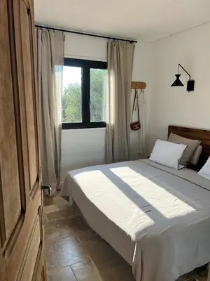 Un ou plusieurs lits dans un hébergement de l'établissement Casa Rose - Maison vue mer !