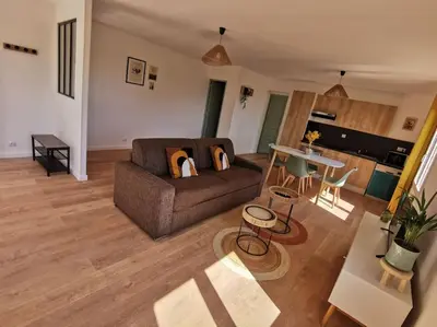 Coin salon dans l'établissement Appartement 2 ou 4 personnes. Venaco
