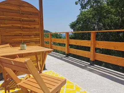 Balcon ou terrasse dans l'établissement Appartement de 30m2 pour 2 personnes Venaco