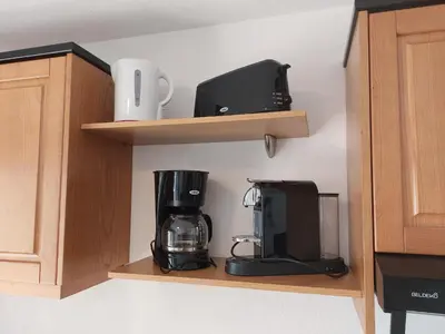 Cuisine ou kitchenette dans l'établissement NOUVEL LOCATION d'un Bel appart T2 climatisé et meublé au RDCh avec piscine dans residence les Melody