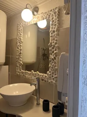 Salle de bains dans l'établissement L’oléado
