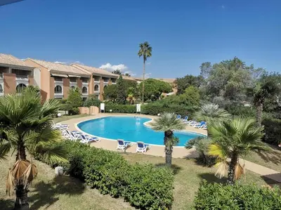 Piscine de l'établissement Studio mezzanine 4 personnes Linguizetta marine de Bravone Corse ou située à proximité
