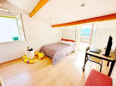 Un ou plusieurs lits dans un hébergement de l'établissement Magnifique duplex de 130 m² à Corte (centre ville)