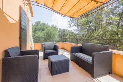 Coin salon dans l'établissement Casa Corsica - Appt climatisé proche de la plage