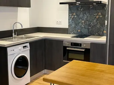 Cuisine ou kitchenette dans l'établissement Appartement centre ville Corte (F)