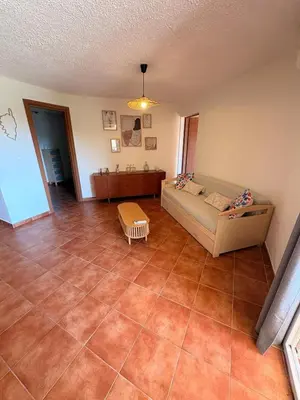 Coin salon dans l'établissement Appartement, 60m2, 6 couchages avec piscines à Marine de Bravone, Linguizetta, résidence Sognu Di mare Corse