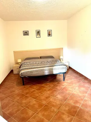 Un ou plusieurs lits dans un hébergement de l'établissement Appartement, 60m2, 6 couchages avec piscines à Marine de Bravone, Linguizetta, résidence Sognu Di mare Corse
