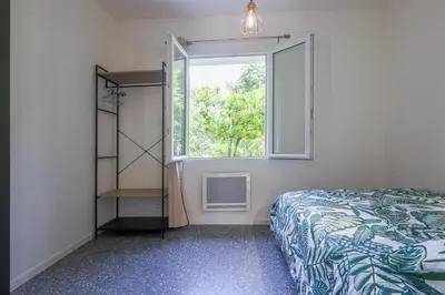 Un ou plusieurs lits dans un hébergement de l'établissement Terrazza Moriani - Charmant appartement à 500m de la mer