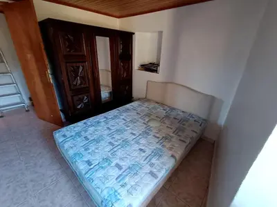 Un ou plusieurs lits dans un hébergement de l'établissement Maison de village