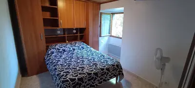 Un ou plusieurs lits dans un hébergement de l'établissement Maison de village