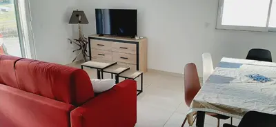 Télévision ou salle de divertissement dans l'établissement Bel appartement Corse côte Est