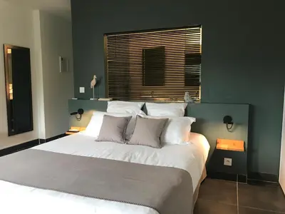 Un ou plusieurs lits dans un hébergement de l'établissement Villa Limone, maison d'hôtes