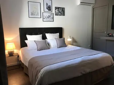 Un ou plusieurs lits dans un hébergement de l'établissement Villa Limone, maison d'hôtes