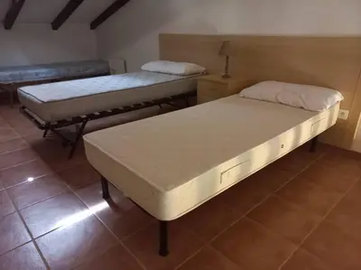 Un ou plusieurs lits dans un hébergement de l'établissement Appartement de vacances Marine de Bravone - Corse