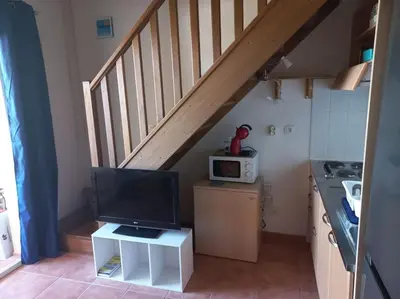 Cuisine ou kitchenette dans l'établissement Appartement de vacances Marine de Bravone - Corse