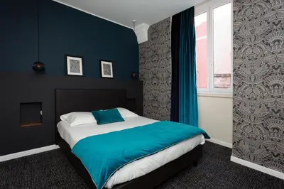 Un ou plusieurs lits dans un hébergement de l'établissement Babbu Hotel