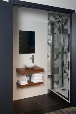 Salle de bains dans l'établissement Babbu Hotel