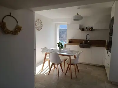 Cuisine ou kitchenette dans l'établissement Maison de charme proche Bastia